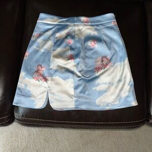 Sugar Thrillz Satin Skirt with Angel Print